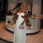 Elegant White Halter Cutout Jumpsuit - Flowy Wide Leg & Backless Design for Date Night & Formal Events - Image 2